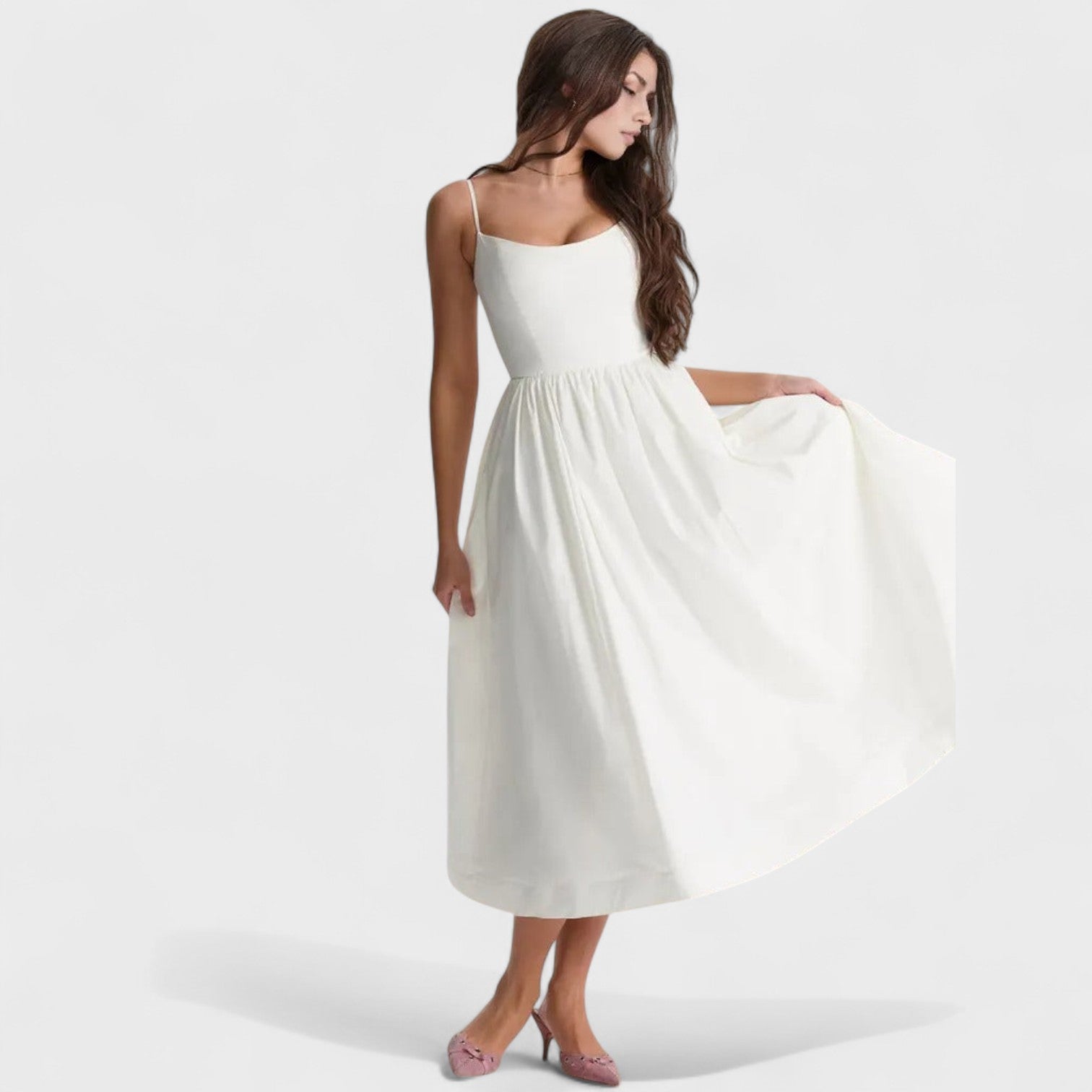Isadora – L’abito midi che danza ad ogni passo