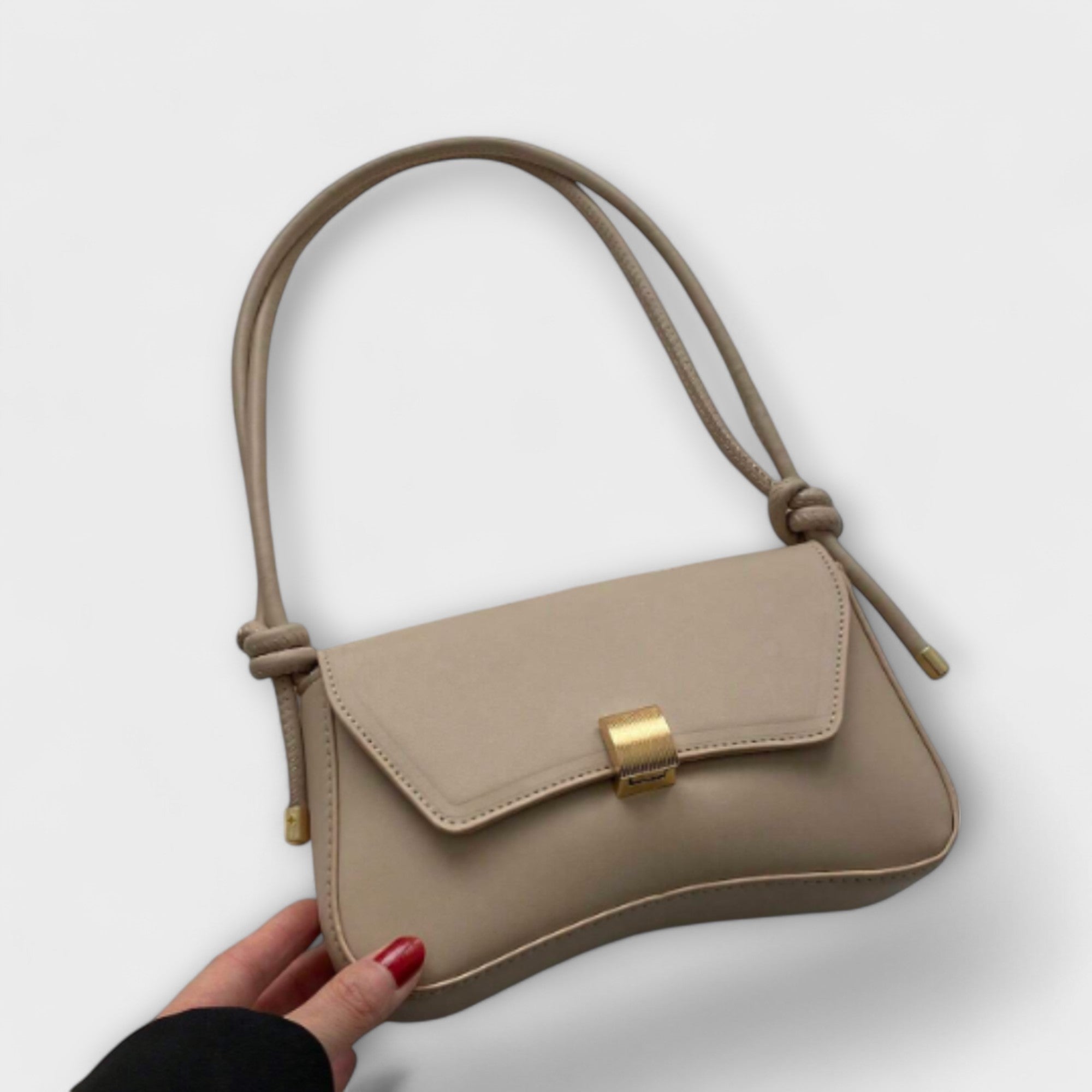 Giulia – Borsa vintage con patta compatta ed elegante