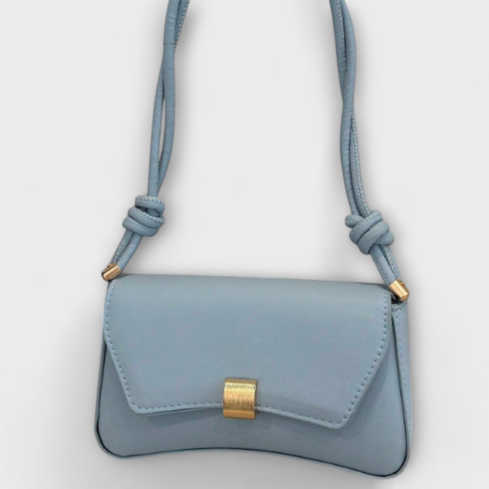 Giulia – Borsa vintage con patta compatta ed elegante