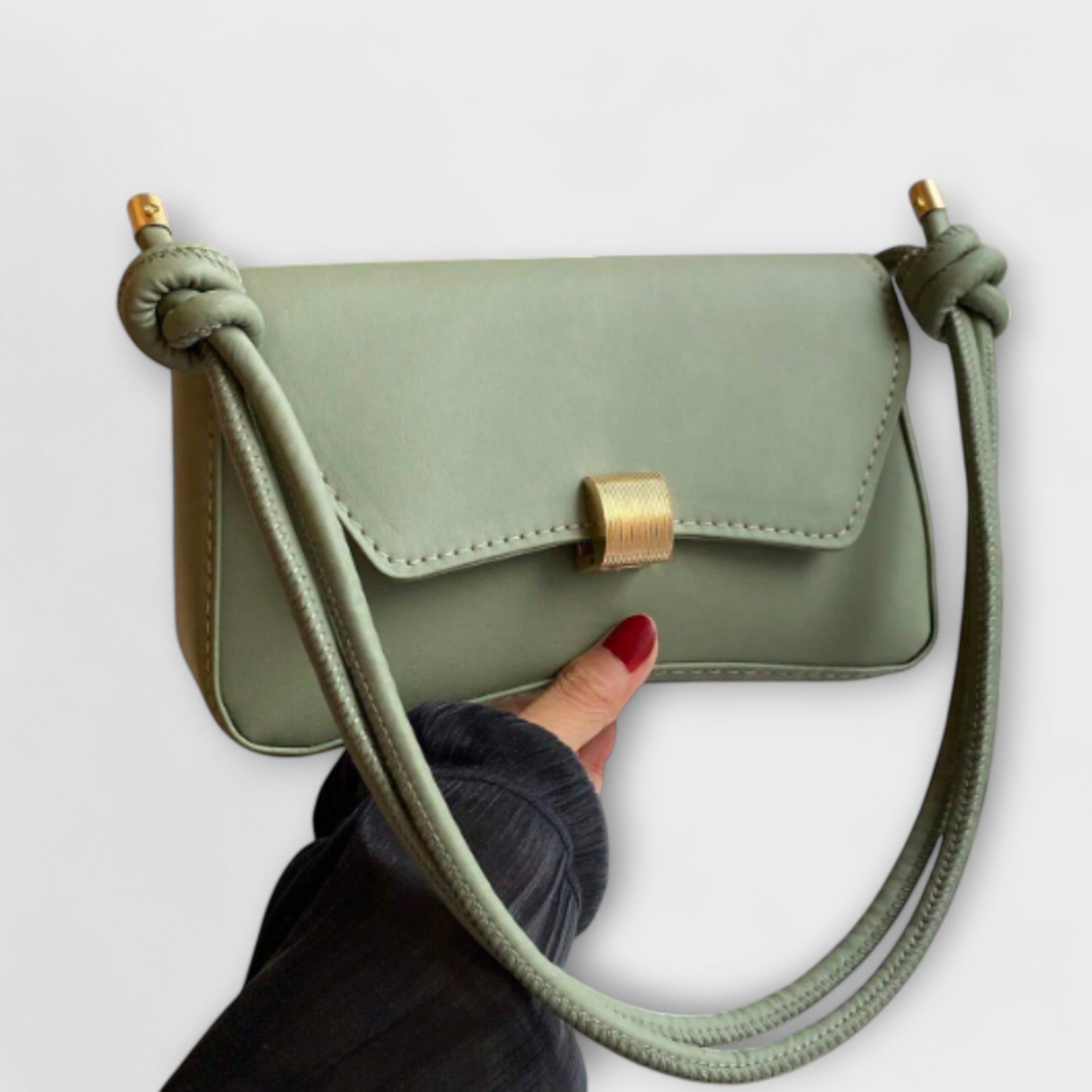 Giulia – Borsa vintage con patta compatta ed elegante