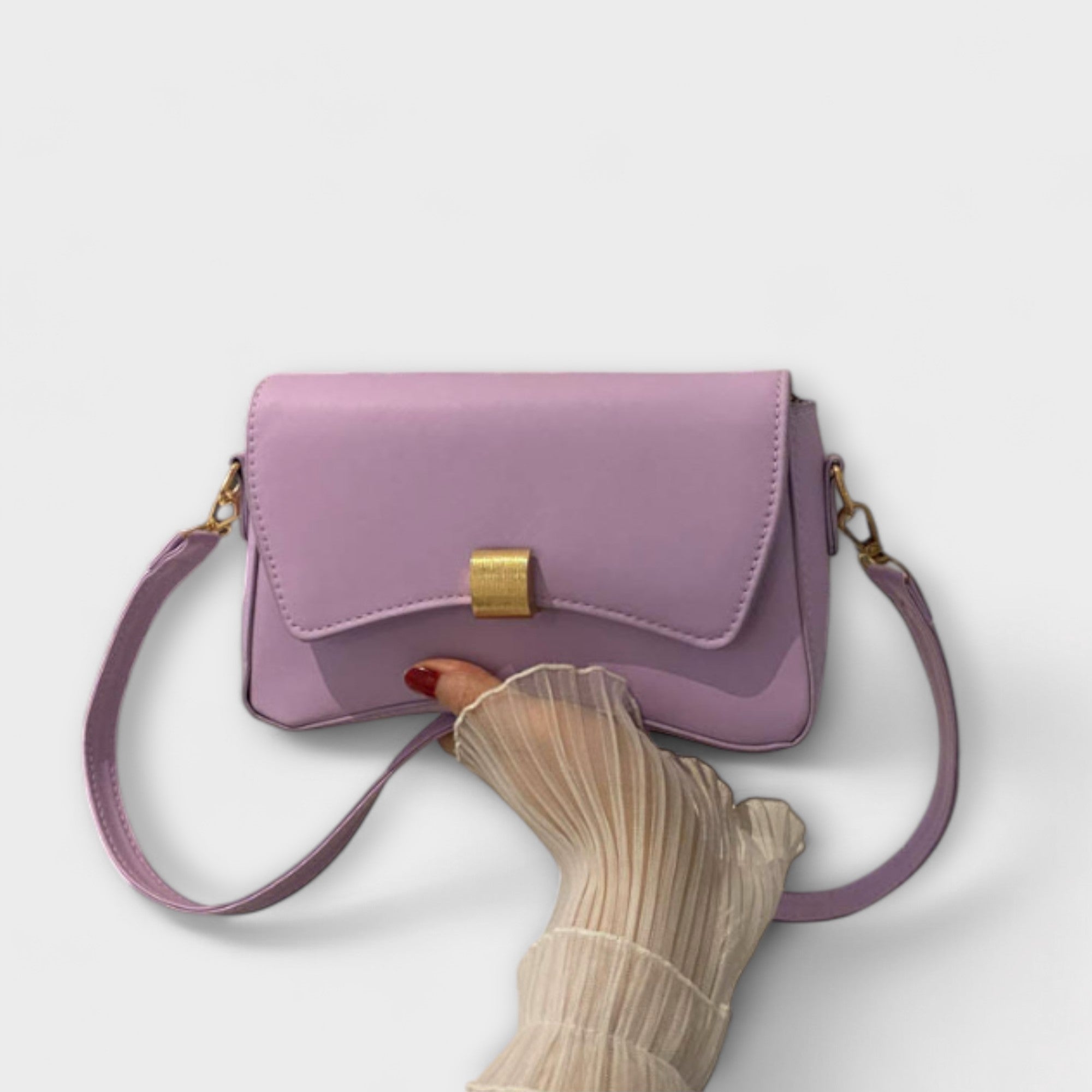 Giulia – Borsa vintage con patta compatta ed elegante